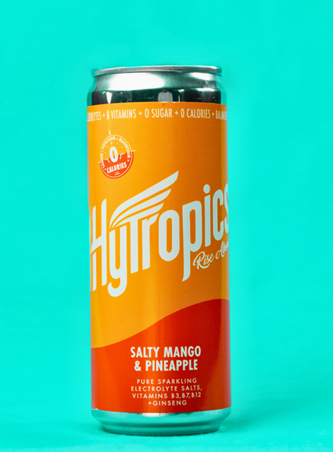 Can of Hytropics Salty Mango & Pineapple drink on a teal background